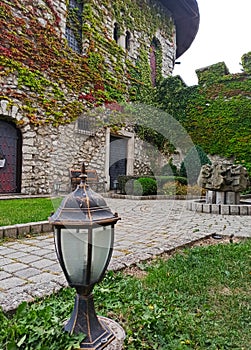 Part of the park and the outer tower of the Neo-Gothic castle of Smolenice, Slovakia