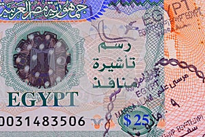 Part photo of Egypt visa with stamp in passport. Visa fee in Egypt $25. Close up view