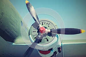 Part plane with the propeller in retro tones