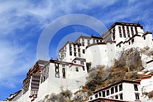 The part of the Potala Palace, with the people republic of China flag inside as well as many windows, curtain, Brick wall, Potala