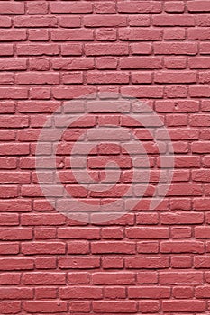 Part of red painted brick wall