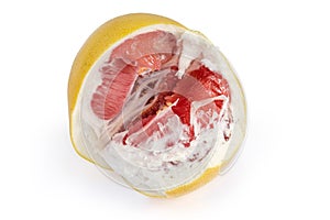 Part of the red pomelo on a white background