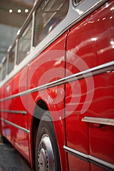 Part of red retro bus.