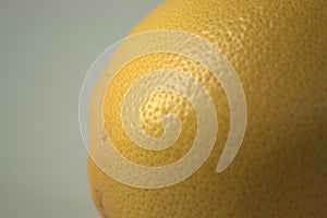 Part of a ripe, juicy, tasty, seductively looking grapefruit. Macro.