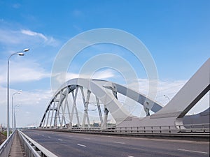 Part of road and railroad bridge with steel arches