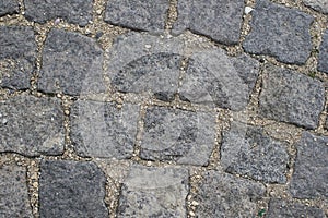 Part of road surface, paved with cobbles