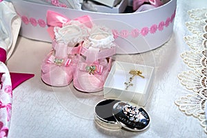 The pink bootees for baby baptism party shower in Romanian tradition celebration photo