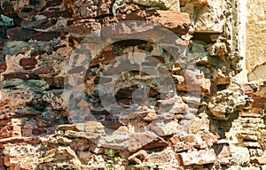 Part of the ruined stone wall of  fortress. Stone texture, abstract background