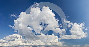 Part of the sky with cumulus mediocris clouds in summer