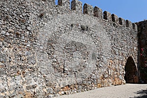 Part of a stone wall with gate
