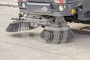 Part of a street cleaning vehicle