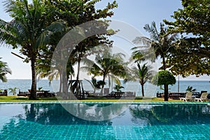 Part of swimming pool with background of tropical sea