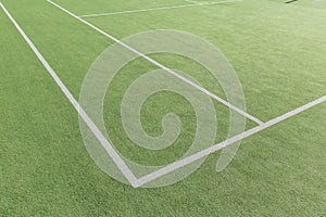 Part of the tennis court with markup. Artificial surface green sports field