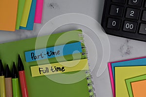 Part-Time or Full Time write on sticky notes isolated on office desk