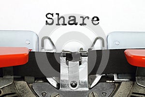 Part of typing machine with typed Share word