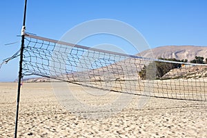 Part of the volleyball net. Active day at beach. Sport background