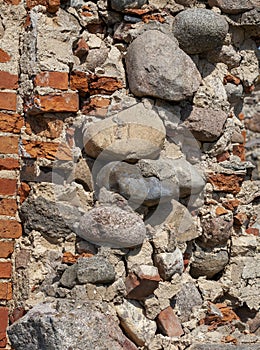 a part of the wall of a building made of bricks