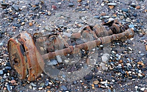 Part of wartime engine on beach in east Yorkshire, UK. photo