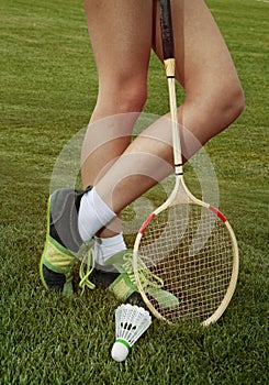 Part of woman who plays badminton