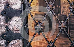 Part of the wrought iron gate entrance to the wine cellar