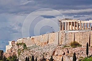 Parthenon ancient temple under impressive cloudy sky, Athens Greece