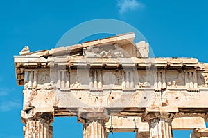 Parthenon temple close-up, Athens, Greece. It is top landmark of Athens. Detail of facade with old relief. Ancient Greek ruins on