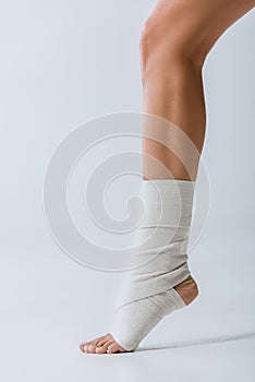 Partial of barefoot girl with elastic