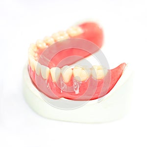 Partial denture production on white background