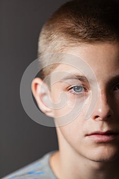 Partial full front face of teenager