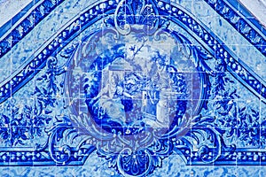 Partial image of a Portuguese tile panel on a garden bench photo