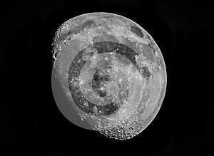 Partial moon in black and white