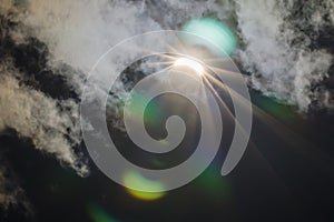 Partial Solar Eclipse Through Clouds