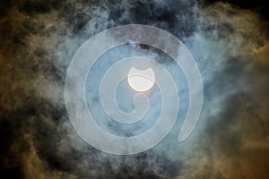 Solar Eclipse on a cloudy day.