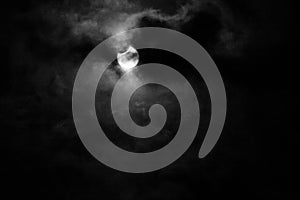 Partial solar eclipse with cloudy sky