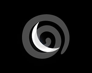 Partial solar eclipse with moon blocking sun, sun shining in a crescent shape in black sky
