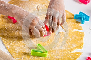 partial view of african american kid making cookies