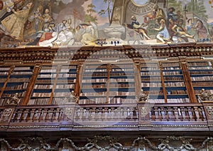 Partial view of bookshelves and ceiling fresco, Philosophical Hall, Strahov Monastery Library, Praque photo