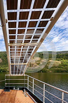 Solar panels power Lake Sanabria environmental cruise in Spain. photo
