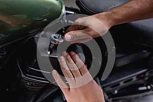 partial view of technician hands examining