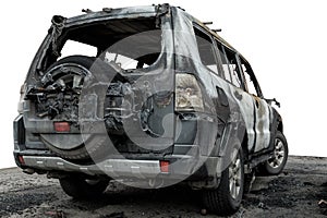 Partially burned down car for use in photomontage, the SUV after the fire, isolate photo