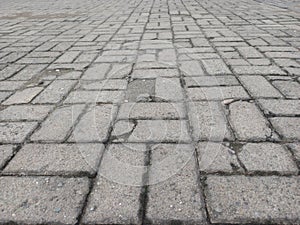 Partially damaged paving block flooring generally occurs due to use or weather factors.