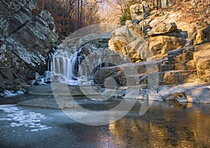 Partially frozen Scott`s Run waterfall in the morning.Scott`s Run Nature Preserve.Fairfax County.Virginia.USA