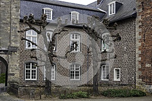 The partially moated Castle Wijnandsrade is located in South Limburg in the village of the same name photo