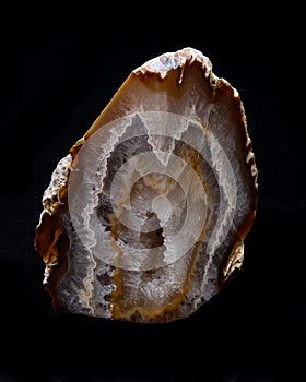 Partially polished multicolor agate geode with crystaline druzy center photo