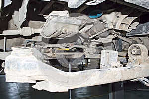 Partially removed front subframe of the car