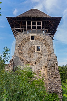 Partially restored tower of a magnificent neviitskogo castle on a mountain near the river Tisza. Uzhhorod Ukraine