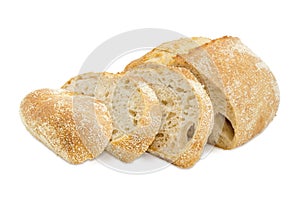 Partially sliced wheat sourdough bread with bran photo