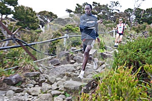 Participant running down Mt Kinabalu