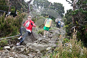 Participant running down Mt Kinabalu