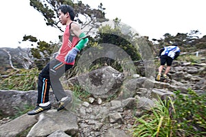 Participant running down Mt Kinabalu
